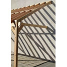 Carport en bois douglas avec toit incliné, accolé à une structure, fabriqué en France